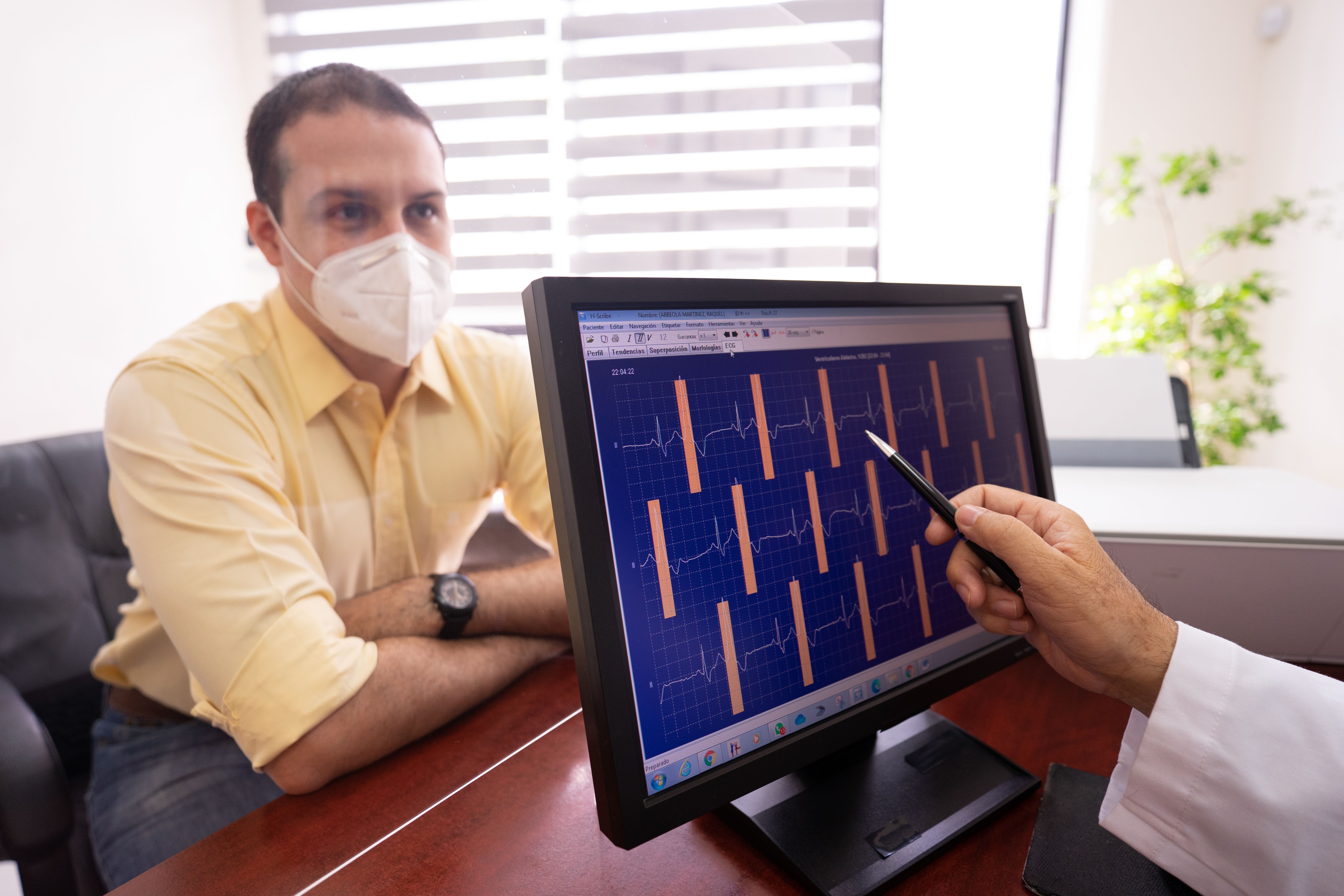Cardiologist reviewing a patient's heart scan